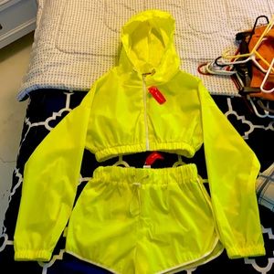 Yellow Shorts with a cropped jacket it’s a size M never worn brand new